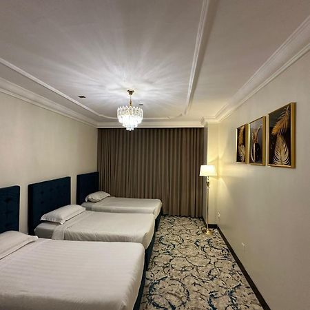 Zad Al Eman Suites Hotels Медина Номер фото