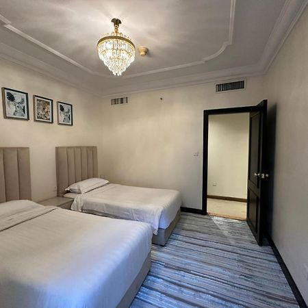 Zad Al Eman Suites Hotels Медина Номер фото