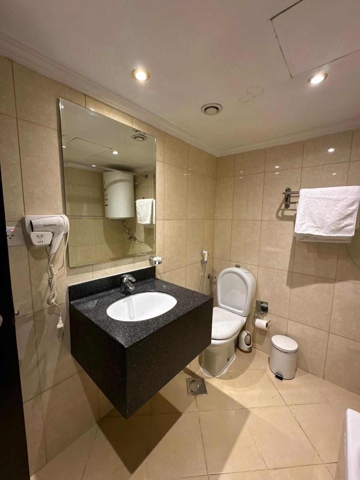Zad Al Eman Suites Hotels Медина Номер фото