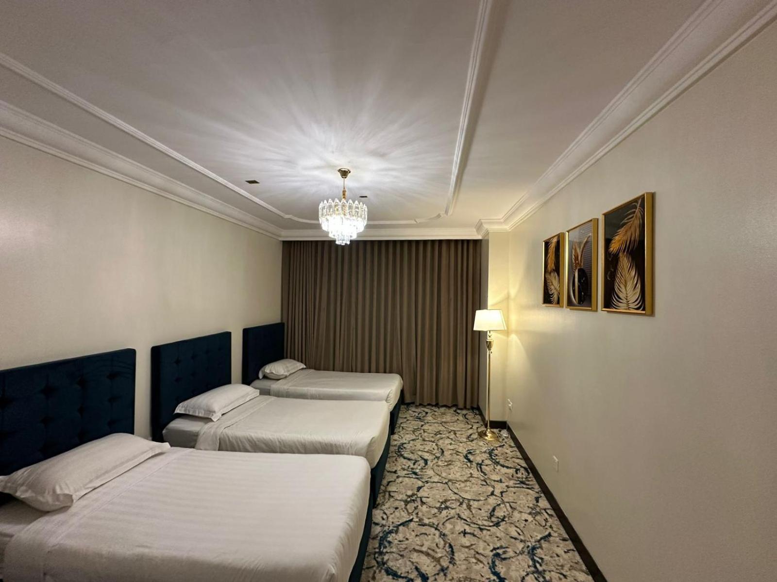 Zad Al Eman Suites Hotels Медина Номер фото