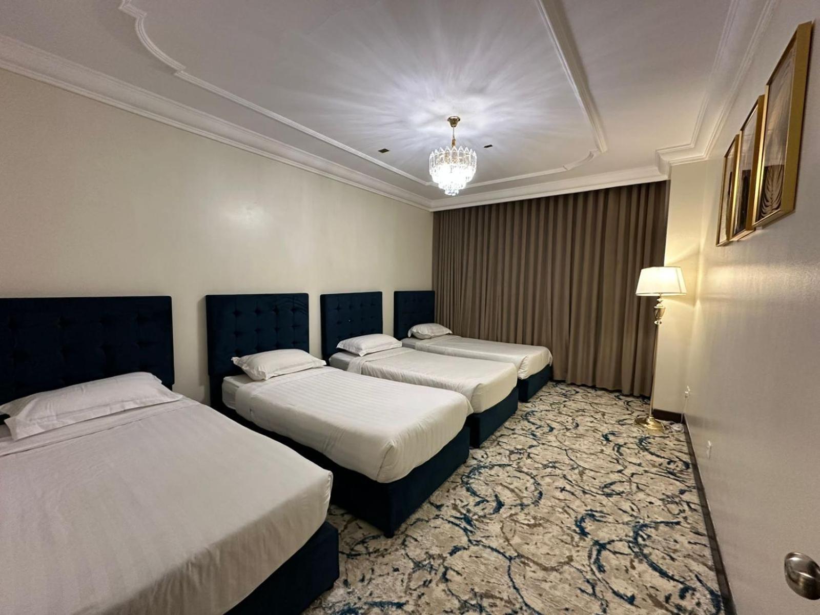 Zad Al Eman Suites Hotels Медина Номер фото