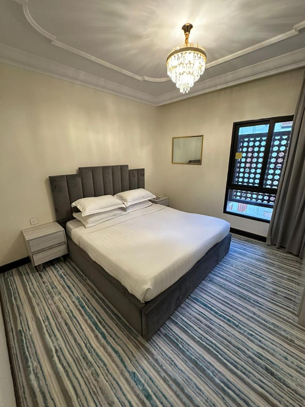 Zad Al Eman Suites Hotels Медина Номер фото